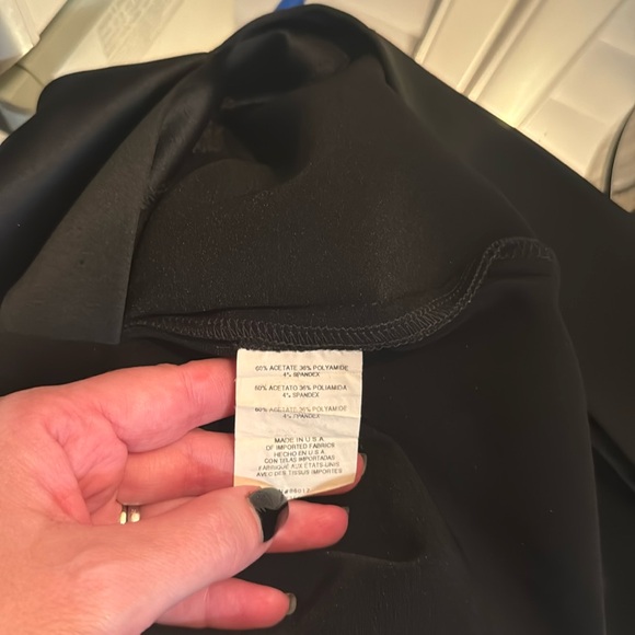 Pre-loved sexy Bebe skirt (satin feel) see pic of tag with actual material. - Picture 7 of 9